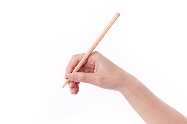 ženská ruka drží tužku, psaní, kreslení, směřující - Fotografie, Obrázek