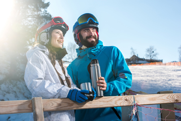 Snowboarders drinking tea  - Valokuva, kuva