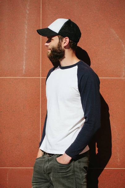 hipster wearing white blank t-shirt with space for your logo - 写真・画像