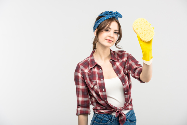 Young woman with sponge - Foto, imagen