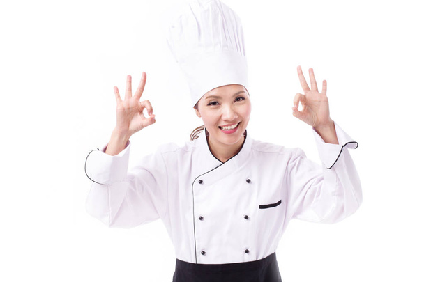 boldog, mosolyog, a pozitív női szakács kettős rendben kéz jel mutatja - Fotó, kép