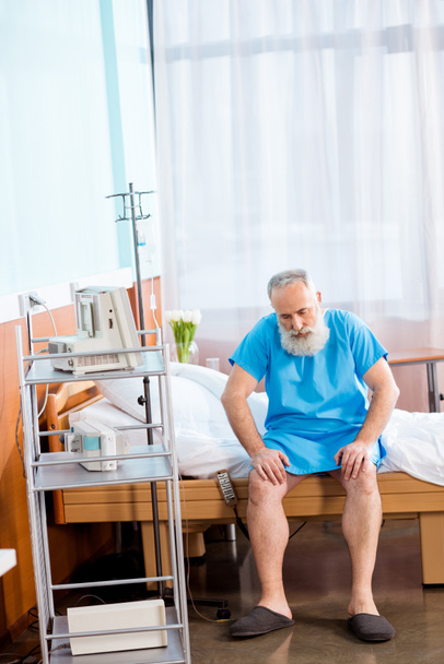 Senior man on hospital bed - Photo, Image