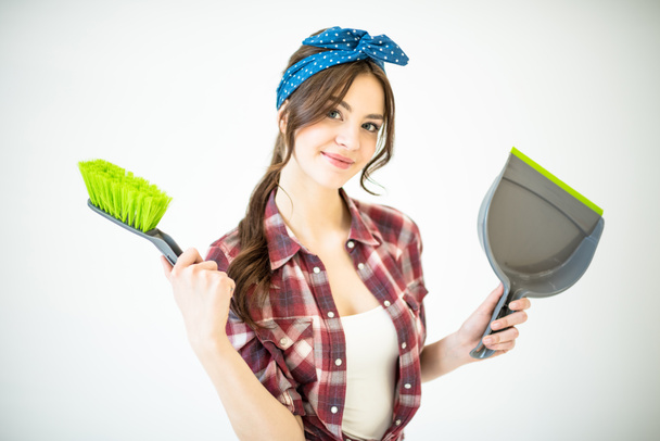 Woman with scoop and brush - Photo, Image