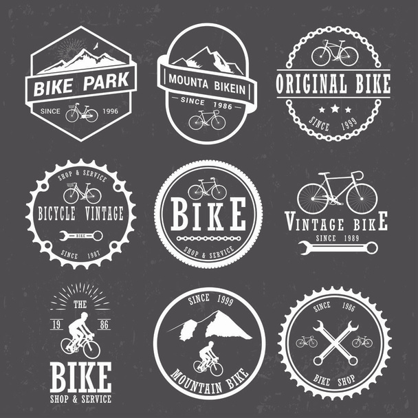 Zestaw vintage i nowoczesny rower sklep logo odznaki i etykiety. - Wektor, obraz
