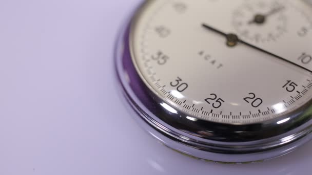 Clock close-up shot on a white background - Footage, Video