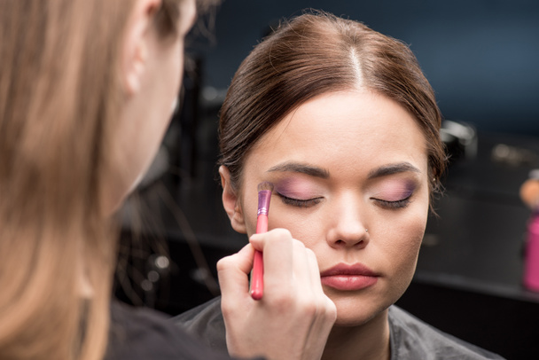 Make-up artist applying eyeshadow - Photo, Image