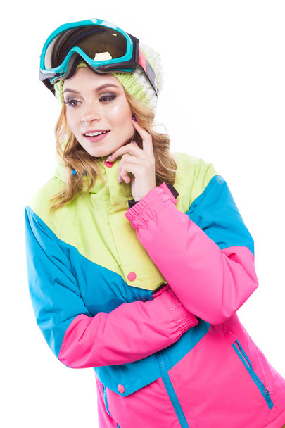ξανθιά γυναίκα στο snowboard σουίτα χέρι στο μάγουλο - Φωτογραφία, εικόνα