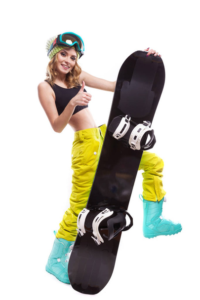 happy blonde slim woman with snowboard - Photo, image