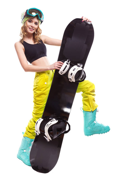 mooi blond meisje met snowboard - Foto, afbeelding