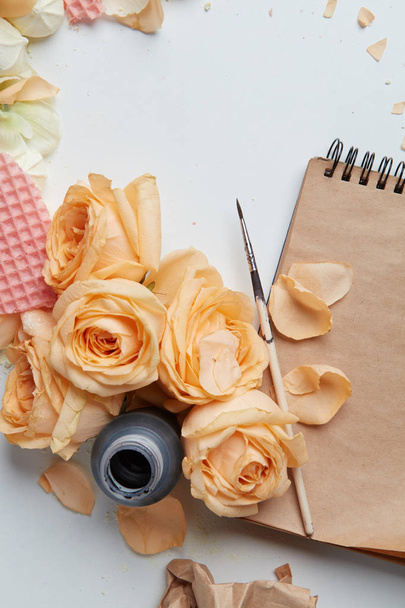 Notepad and roses composition - Photo, Image