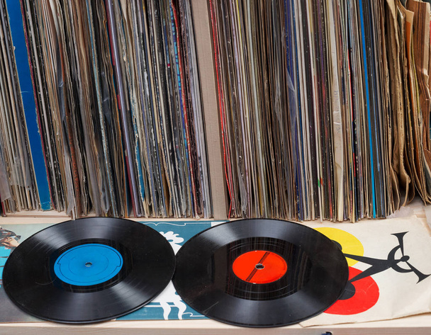 Browsing through vinyl records collection. Music background. Copy space. - Photo, Image