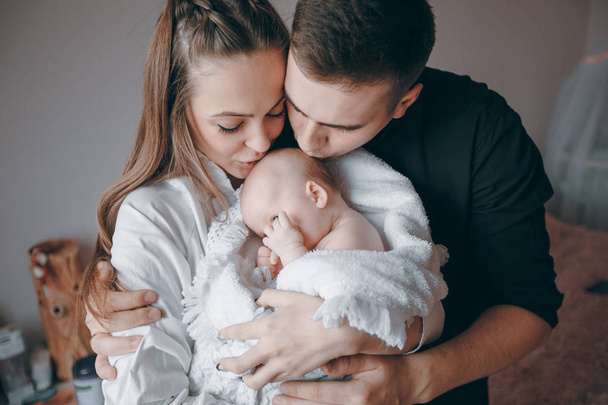 young family with infant - Foto, Bild