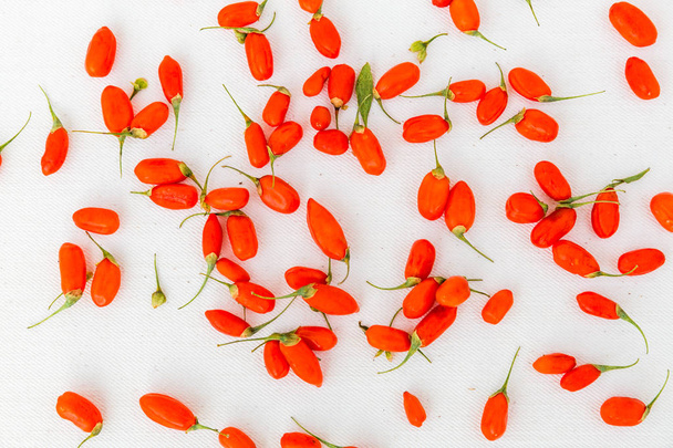 View of Goji berries on a white background - Фото, изображение