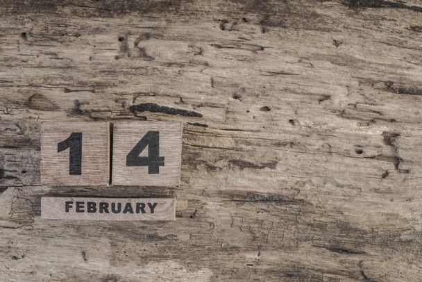 kocka naptári február fából készült háttér - Fotó, kép