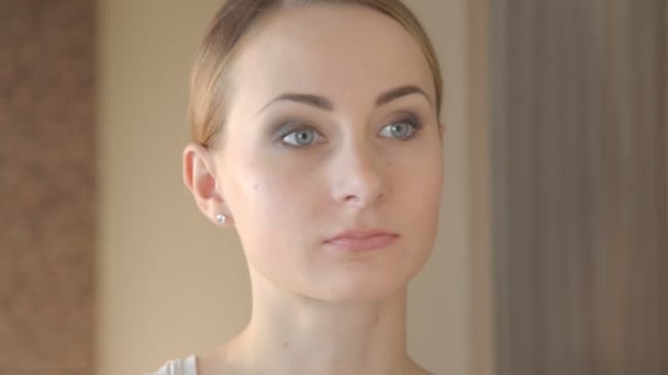 Closeup portrait of beautiful woman touching face skincare concept - Imágenes, Vídeo