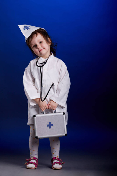 little girl with doctors uniform - Foto, immagini