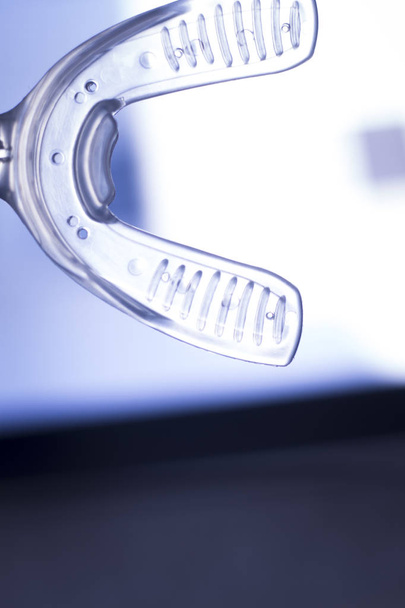 Vibrador dental de soporte dental
 - Foto, imagen