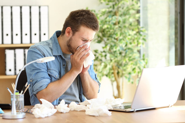 Entrepreneur blowing with a wipe at office - Fotó, kép