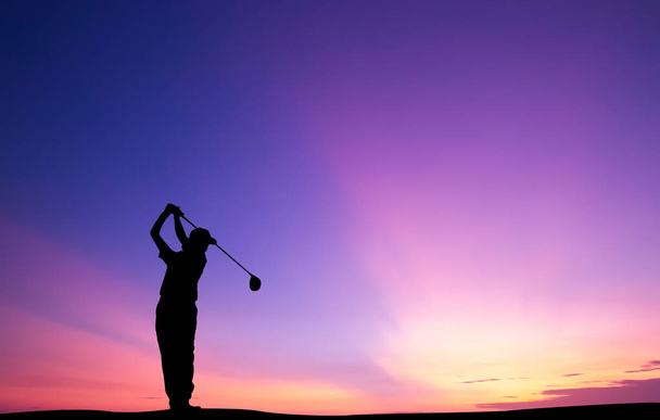 silhouette golfer playing golf during beautiful sunset - Photo, Image
