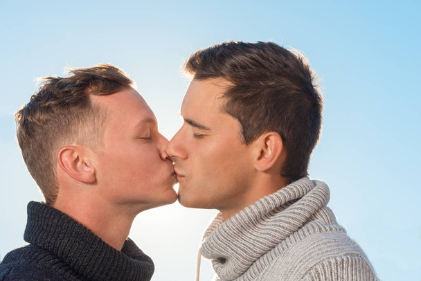 gay couple kissing each other  - Фото, изображение