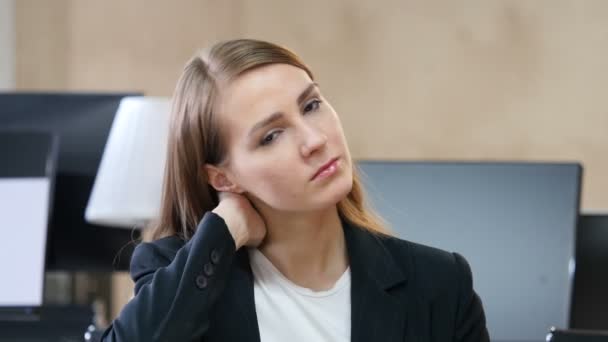 Tired Woman in Office with Neck Pain - Záběry, video
