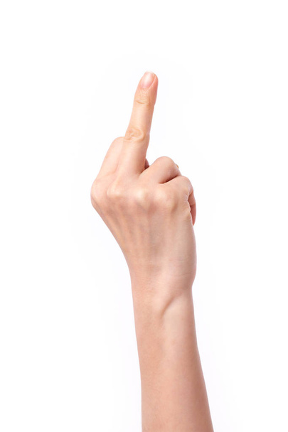 hand pointing up middle finger, concept of rude hand sign or hand gesture, studio isolated - Fotó, kép