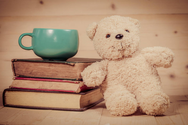 bear toy with cup of coffee - 写真・画像