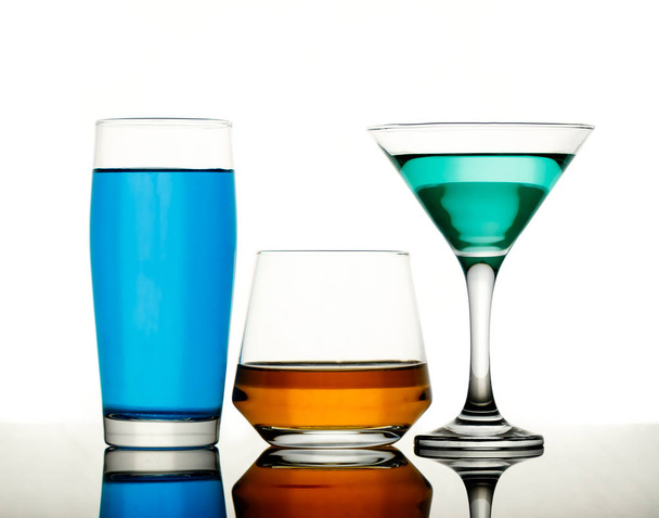 drinks in various alcoholic glasses  - Фото, изображение