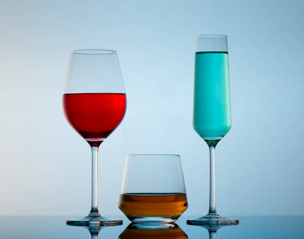 drinks in various alcoholic glasses  - Photo, image