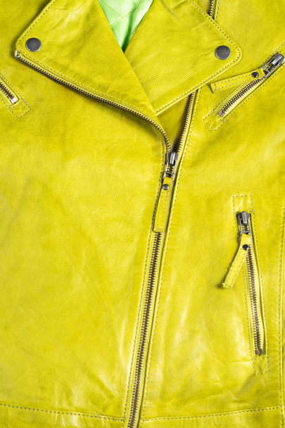 Green color leather jacket. Leather jacket macro details. - Zdjęcie, obraz
