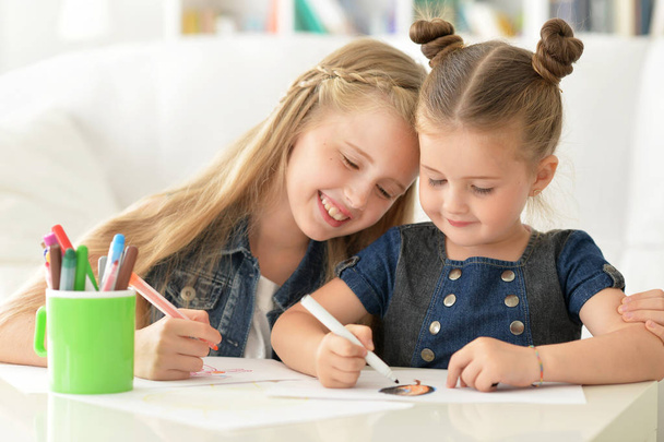 Sisters drawing with pencils - Photo, Image