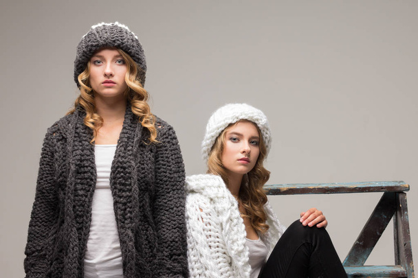 Twins girls in knitted hats - Photo, Image