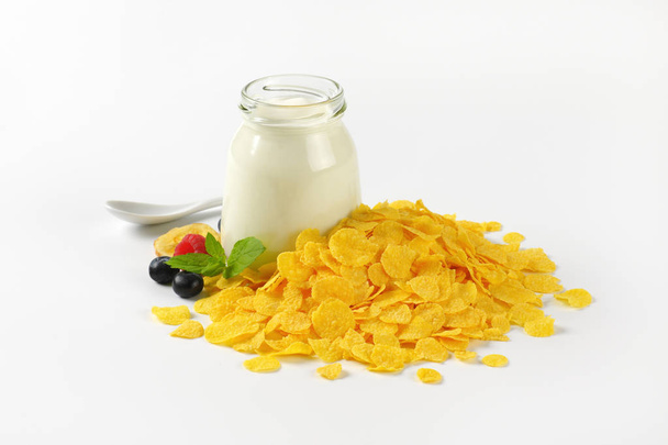 corn flakes and white yogurt - Photo, Image