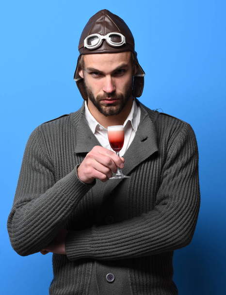 bearded pilot with cocktail in glass - Fotoğraf, Görsel