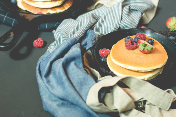 pancake with fresh fruit and berry stack on pan - Photo, Image