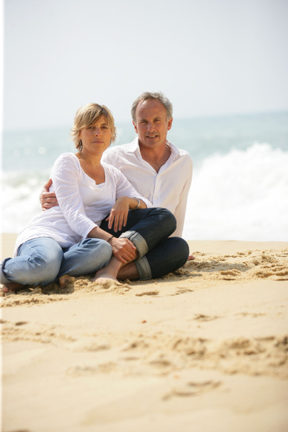 Adult couple at the beach - Photo, Image