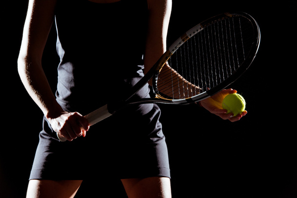 Femme avec raquette de tennis et balle
 - Photo, image