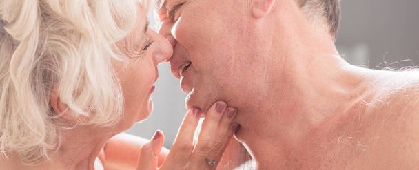 Senior couple kissing each other - Photo, Image