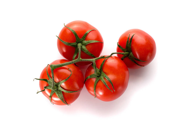 Four red sochtyts tomato on white background - Foto, imagen