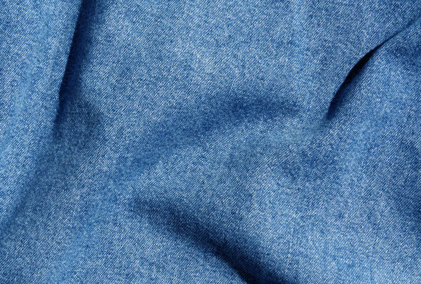 Blue color denim cloth texture.  - Фото, зображення
