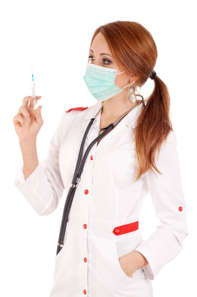 Young doctor holding syringe - Foto, immagini