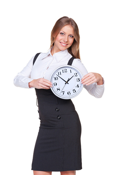 красива бізнес-леді тримає годинник
 - Фото, зображення