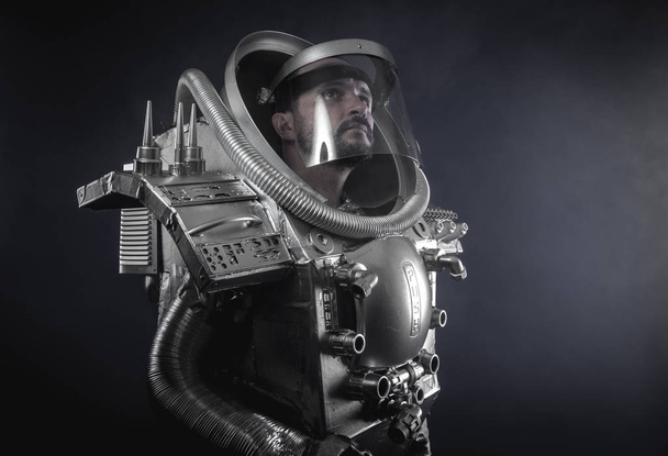 Astronaut dressed in silver space suit - Zdjęcie, obraz