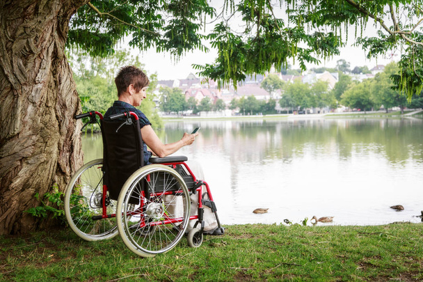 Senior Woman In Wheelchair - Foto, Bild