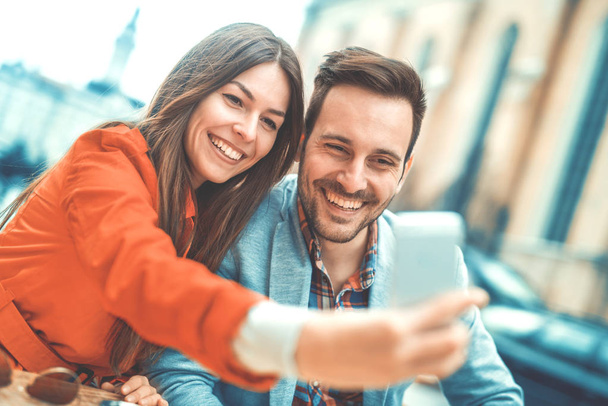 Young couple taking a selfie - Photo, Image