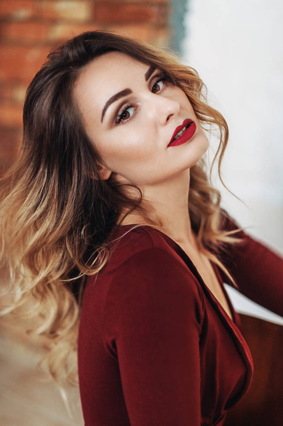 woman with makeup in red dress - Fotoğraf, Görsel