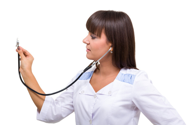 Portrait of young doctor or medic with stethoscope - Foto, imagen