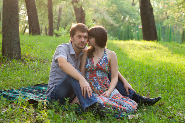 Young couple on a romantic picnic outdoors - Valokuva, kuva