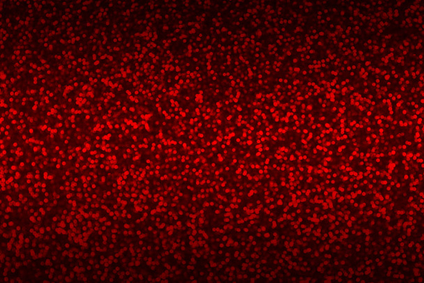 Piros-fekete elmosódott csillogó bokeh absztrakt háttér - Fotó, kép