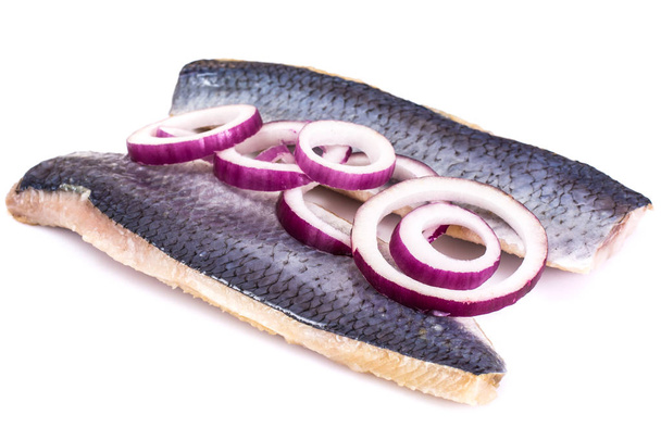 Fillet of salted herring with red onion rings - Photo, Image